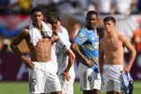 EAST RUTHERFORD, NEW JERSEY - JULY 09: (L-R) Jude Bellingham, David Alaba and Arda Güler of Real Madrid show their dejection at the end of the FIFA Club World Cup 2025 semi-final match between Paris Saint-Germain and Real Madrid CF at MetLife Stadium on July 09, 2025 in East Rutherford, New Jersey. (Photo by David Ramos/Getty Images)