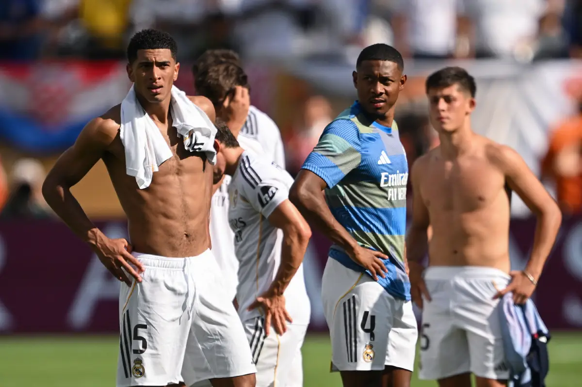 EAST RUTHERFORD, NEW JERSEY - JULY 09: (L-R) Jude Bellingham, David Alaba and Arda Güler of Real Madrid show their dejection at the end of the FIFA Club World Cup 2025 semi-final match between Paris Saint-Germain and Real Madrid CF at MetLife Stadium on July 09, 2025 in East Rutherford, New Jersey. (Photo by David Ramos/Getty Images)