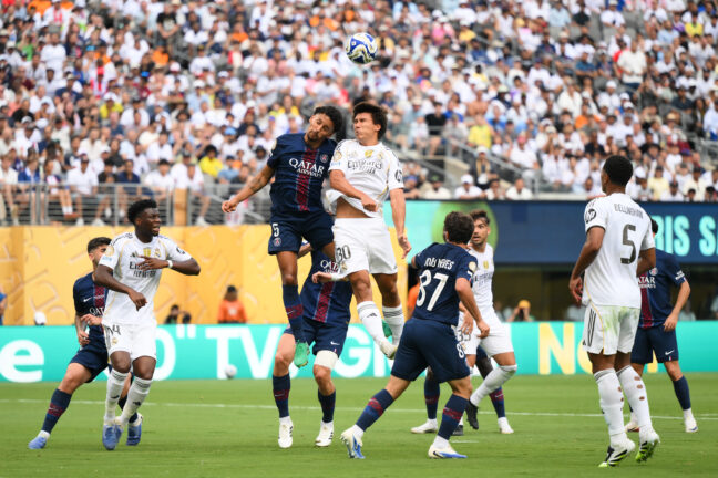 EAST RUTHERFORD, NEW JERSEY - JULY 09: Gonzalo Garcia #30 of Real Madrid C.F. jumps for a header against Marquinhos #5 of Paris Saint-Germain during the FIFA Club World Cup 2025 semi-final match between Paris Saint-Germain and Real Madrid CF at MetLife Stadium on July 09, 2025 in East Rutherford, New Jersey. (Photo by David Ramos/Getty Images)