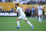 EAST RUTHERFORD, NEW JERSEY - JULY 09: Dani Carvajal #2 of Real Madrid C.F. checks into the match during the FIFA Club World Cup 2025 semi-final match between Paris Saint-Germain and Real Madrid CF at MetLife Stadium on July 09, 2025 in East Rutherford, New Jersey. (Photo by David Ramos/Getty Images)