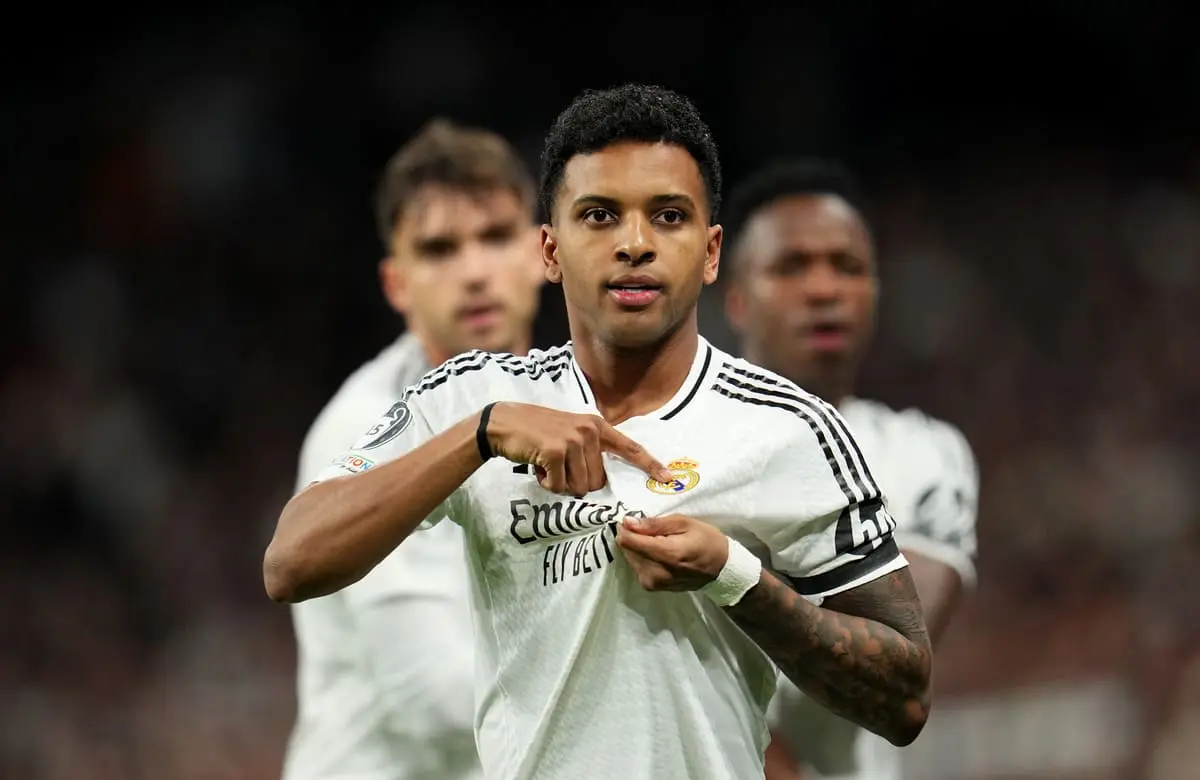 MADRID, SPAIN - MARCH 04: Rodrygo of Real Madrid celebrates scoring his team's first goal during the UEFA Champions League 2024/25 Round of 16 first leg match between Real Madrid C.F. and Atletico de Madrid at Santiago Bernabeu Stadium on March 04, 2025 in Madrid, Spain. (Photo by Aitor Alcalde/Getty Images)