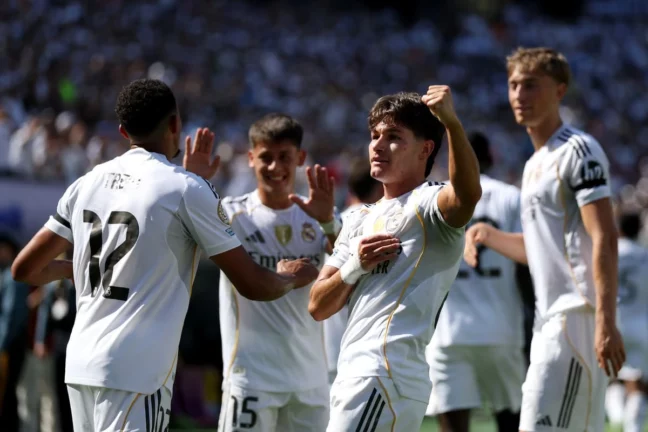 EAST RUTHERFORD, NEW JERSEY - JULY 05: Fran Garcia #20 of Real Madrid C. F. celebrates scoring his team's second goal during the FIFA Club World Cup 2025 quarter-final match between Real Madrid CF and Borussia Dortmund at MetLife Stadium on July 05, 2025 in East Rutherford, New Jersey. (Photo by Francois Nel/Getty Images).