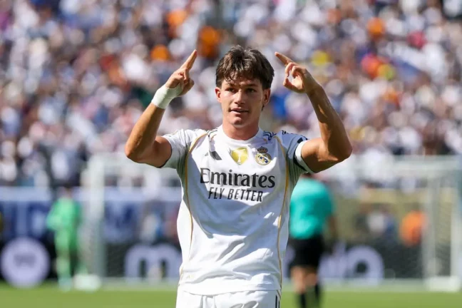 EAST RUTHERFORD, NEW JERSEY - JULY 05: Fran Garcia #20 of Real Madrid C. F. celebrates scoring his team's second goal during the FIFA Club World Cup 2025 quarter-final match between Real Madrid CF and Borussia Dortmund at MetLife Stadium on July 05, 2025 in East Rutherford, New Jersey. (Photo by Francois Nel/Getty Images).