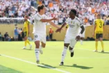 EAST RUTHERFORD, NEW JERSEY - JULY 05: Gonzalo Garcia #30 of Real Madrid celebrates scoring his team's first goal with team mate Vinicius Junior #7 of Real Madrid during the FIFA Club World Cup 2025 quarter-final match between Real Madrid CF and Borussia Dortmund at MetLife Stadium on July 05, 2025 in East Rutherford, New Jersey. (Photo by Luke Hales/Getty Images)