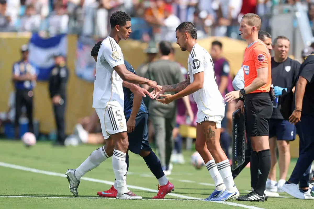CHARLOTTE, NORTH CAROLINA - JUNE 22: Jude Bellingham #5 of Real Madrid C. F. is substituted by Dani Ceballos #19 of Real Madrid C. F. during the FIFA Club World Cup 2025 group H match between Real Madrid CF and CF Pachuca at Bank of America Stadium on June 22, 2025 in Charlotte, North Carolina. (Photo by Richard Pelham/Getty Images)