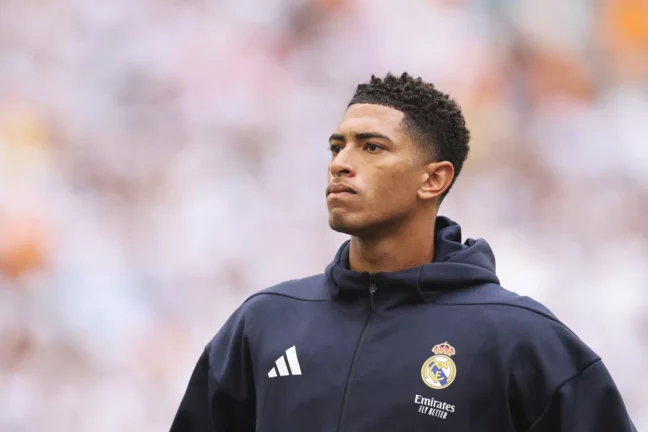 MIAMI GARDENS, FLORIDA - JULY 01: Jude Bellingham #5 of Real Madrid C.F. looks on prior to the FIFA Club World Cup 2025 round of 16 match between Real Madrid CF and Juventus FC at Hard Rock Stadium on July 01, 2025 in Miami Gardens, Florida. (Photo by Michael Reaves/Getty Images)