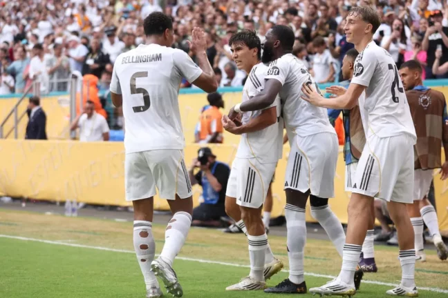 MIAMI GARDENS, FLORIDA - JULY 01: Gonzalo Garcia #30 of Real Madrid C.F. celebrates scoring his team's first goal with Antonio Ruediger #22, Dean Huijsen #24 and Jude Bellingham #5 of Real Madrid C.F. during the FIFA Club World Cup 2025 round of 16 match between Real Madrid CF and Juventus FC at Hard Rock Stadium on July 01, 2025 in Miami Gardens, Florida. (Photo by Megan Briggs/Getty Images)
