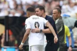 MIAMI GARDENS, FLORIDA - JULY 01: Kylian Mbappe #9 of Real Madrid C.F. speaks with Xabi Alonso, Head Coach of Real Madrid C.F., as he enters the pitch during the FIFA Club World Cup 2025 round of 16 match between Real Madrid CF and Juventus FC at Hard Rock Stadium on July 01, 2025 in Miami Gardens, Florida. (Photo by Megan Briggs/Getty Images)