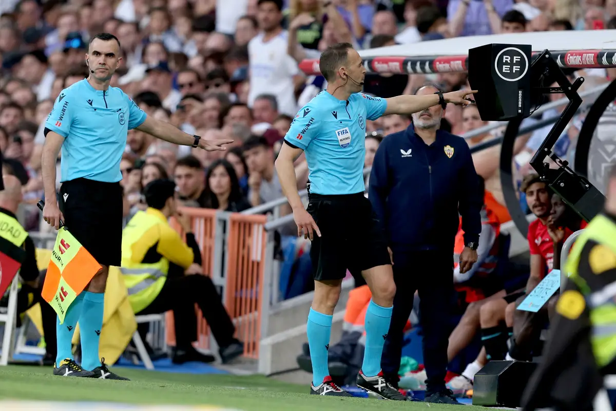 MADRID, SPAIN - APRIL 29: Referee, Guillermo Cuadra Fernandez checks the VAR screen during the LaLiga Santander match between Real Madrid CF and UD Almeria at Estadio Santiago Bernabeu on April 29, 2023 in Madrid, Spain. (Photo by Florencia Tan Jun/Getty Images)