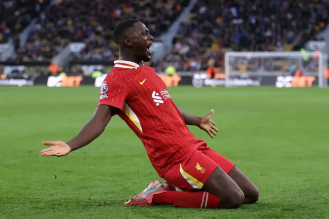 WOLVERHAMPTON, ENGLAND - SEPTEMBER 28: Ibrahima Konate of Liverpool celebrates scoring his team's first goal during the Premier League match between Wolverhampton Wanderers FC and Liverpool FC at Molineux on September 28, 2024 in Wolverhampton, England. (Photo by Michael Steele/Getty Images)