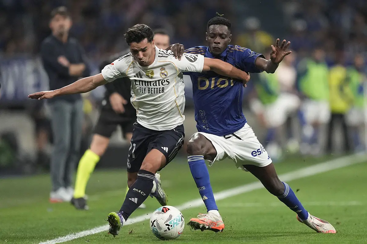 OVIEDO, SPAIN - AUGUST 24: Brahim Díaz of Real Madrid is challenged by Rahim Alhassane of Real Oviedo during the LaLiga EA Sports match between Real Oviedo and Real Madrid CF at Carlos Tartiere on August 24, 2025 in Oviedo, Spain. (Photo by Juan Manuel Serrano Arce/Getty Images)