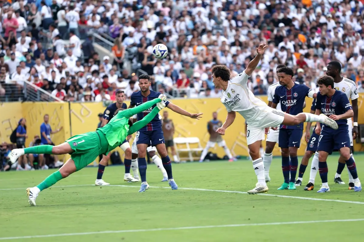 EAST RUTHERFORD, NEW JERSEY - JULY 09: Gianluigi Donnarumma #1 of Paris Saint-Germain makes a save from Gonzalo Garcia #30 of Real Madrid C.F. during the FIFA Club World Cup 2025 semi-final match between Paris Saint-Germain and Real Madrid CF at MetLife Stadium on July 09, 2025 in East Rutherford, New Jersey. (Photo by Buda Mendes/Getty Images)