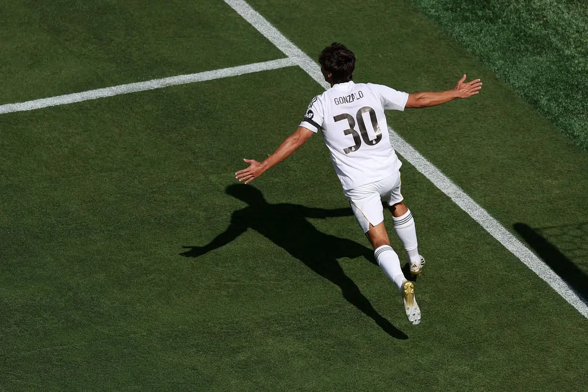 EAST RUTHERFORD, NEW JERSEY - JULY 05: Gonzalo Garcia #30 of Real Madrid celebrates scoring his team's first goal during the FIFA Club World Cup 2025 quarter-final match between Real Madrid CF and Borussia Dortmund at MetLife Stadium on July 05, 2025 in East Rutherford, New Jersey. (Photo by Al Bello/Getty Images)