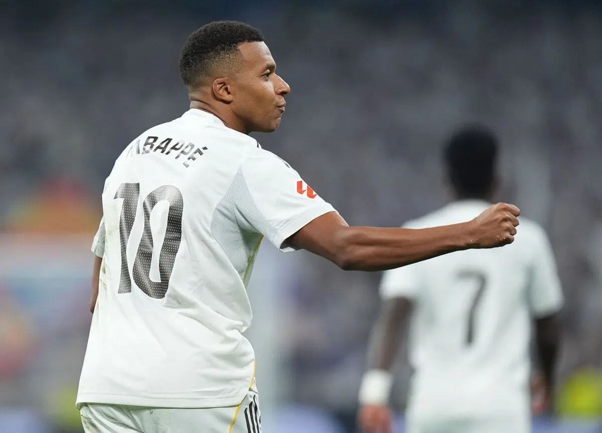 MADRID, SPAIN - AUGUST 19: Kylian Mbappé of Real Madrid celebrates scoring his team's first goal during the LaLiga EA Sports match between Real Madrid CF and CA Osasuna at Estadio Santiago Bernabeu on August 19, 2025 in Madrid, Spain. (Photo by Angel Martinez/Getty Images)