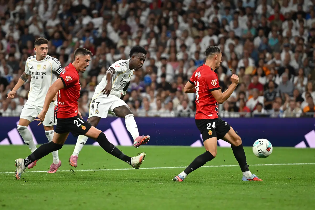 MADRID, SPAIN - AUGUST 30: Vinicius Junior of Real Madrid scores his team's second goal during the LaLiga EA Sports match between Real Madrid CF and RCD Mallorca at Estadio Santiago Bernabeu on August 30, 2025 in Madrid, Spain. (Photo by Denis Doyle/Getty Images)
