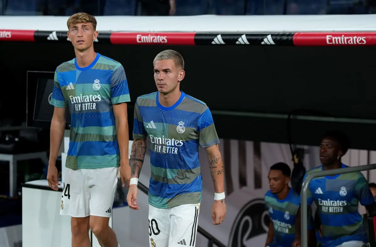 MADRID, SPAIN - AUGUST 30: Dean Huijsen and Franco Mastantuono of Real Madrid make their way out to warm up prior to the LaLiga EA Sports match between Real Madrid CF and RCD Mallorca at Estadio Santiago Bernabeu on August 30, 2025 in Madrid, Spain. (Photo by Angel Martinez/Getty Images)