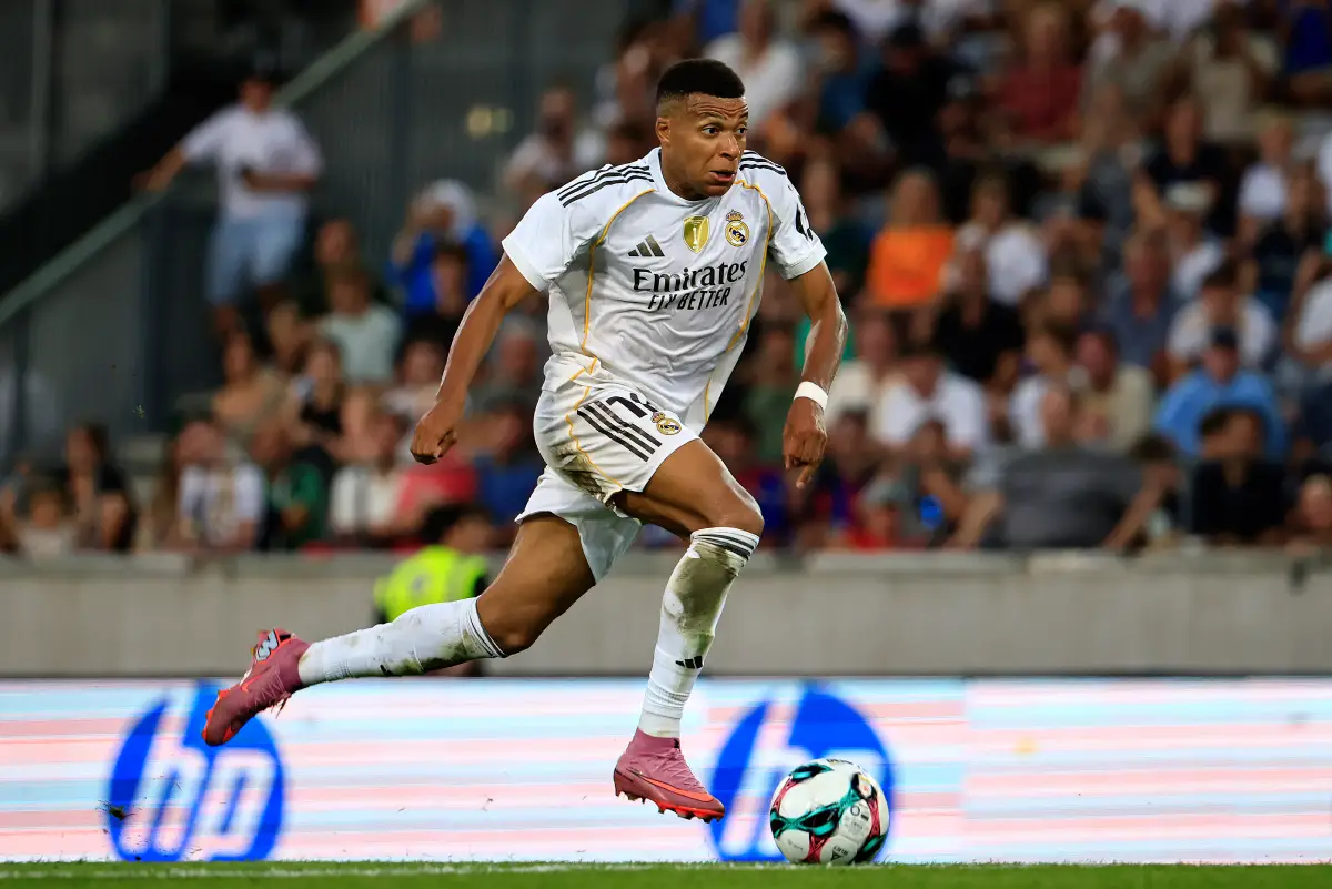 INNSBRUCK, AUSTRIA - AUGUST 12: Kylian Mbappe of Real Madrid runs with the ball during the pre-season friendly match between WSG Tirol and Real Madrid CF at Tivoli Stadion Tirol on August 12, 2025 in Innsbruck, Austria. (Photo by Jan Hetfleisch/Getty Images)