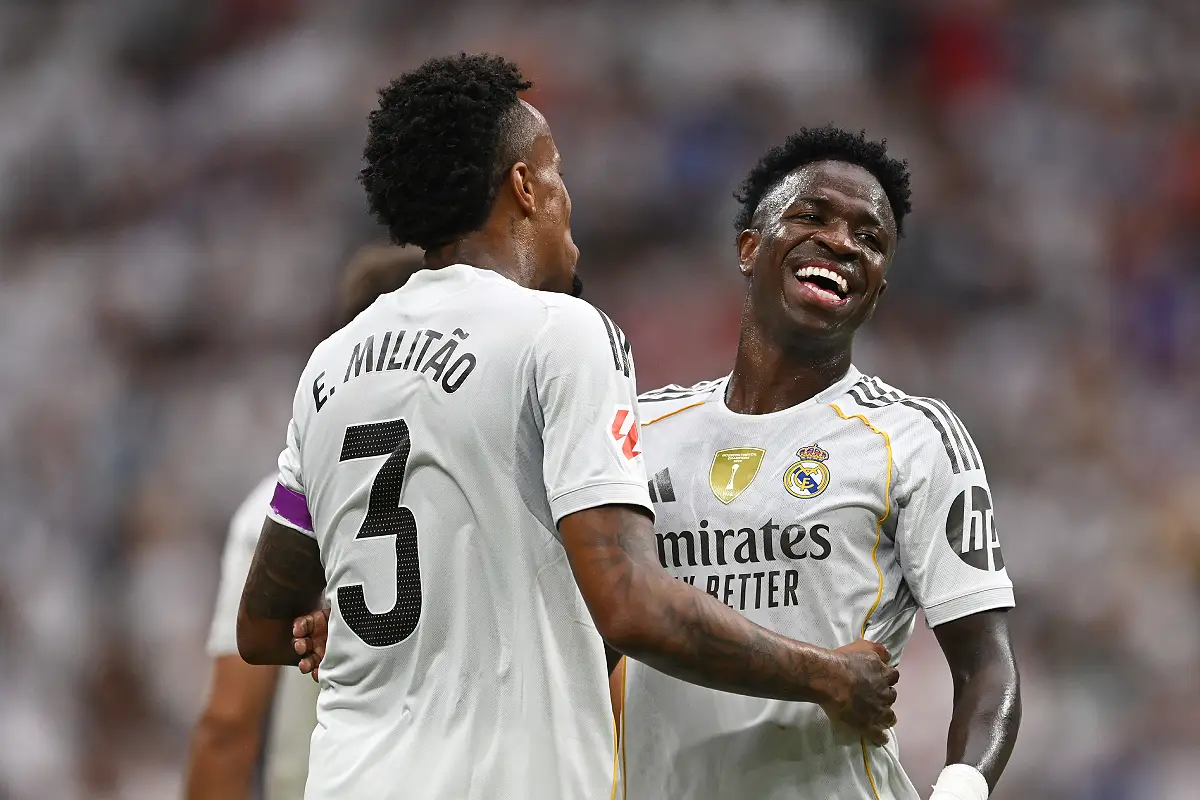 MADRID, SPAIN - SEPTEMBER 20: Eder Militao of Real Madrid celebrates scoring his team's first goal with teammate Vinicius Junior during the LaLiga EA Sports match between Real Madrid CF and RCD Espanyol de Barcelona at Estadio Santiago Bernabeu on September 20, 2025 in Madrid, Spain. (Photo by Denis Doyle/Getty Images)