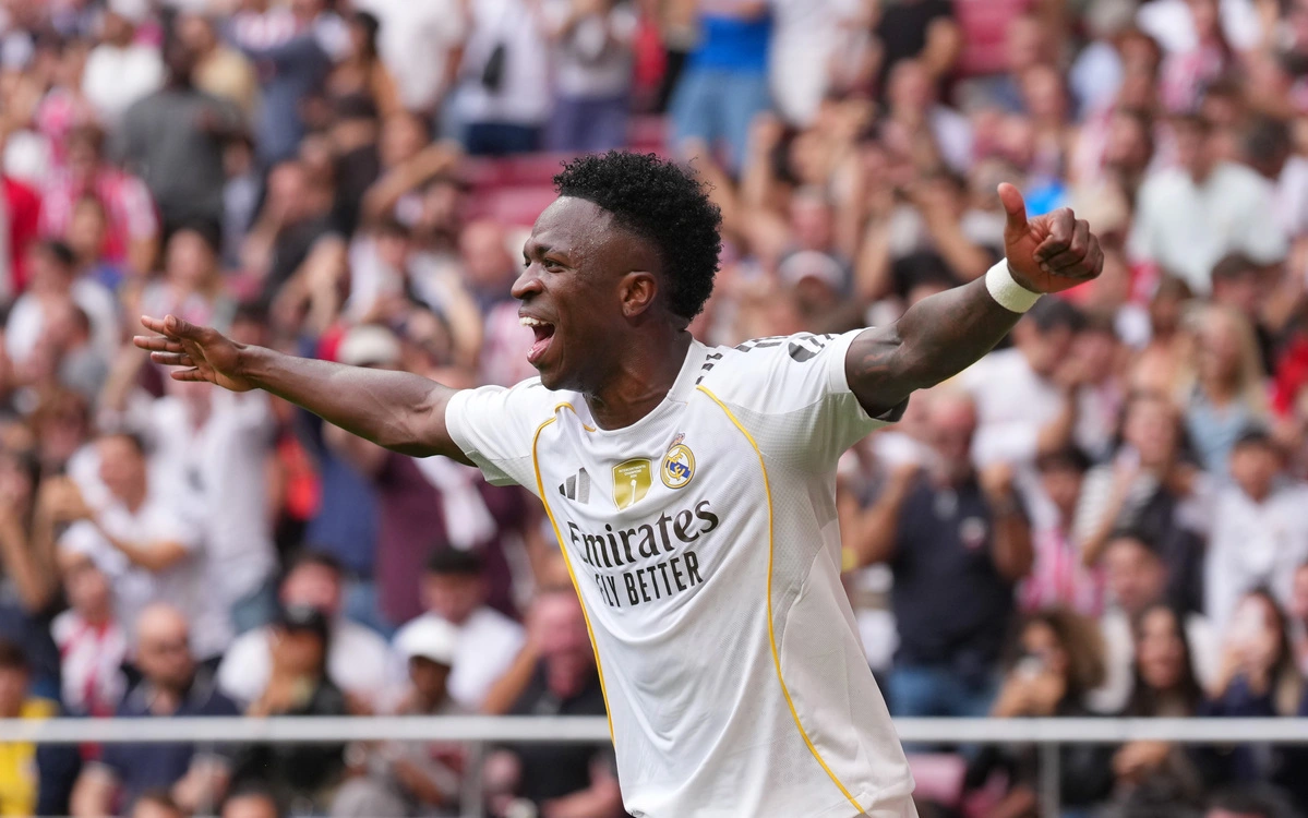 MADRID, SPAIN - SEPTEMBER 27: Vinicius Jr. of Real Madrid celebrates his teams first goal scored by Kylian Mbappe (not pictured) during the LaLiga EA Sports match between Atletico de Madrid and Real Madrid CF at Riyadh Air Metropolitano on September 27, 2025 in Madrid,