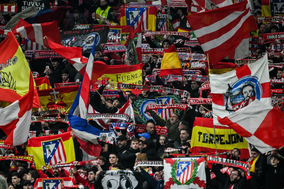 MADRID, SPAIN - NOVEMBER 07: Atletico de Madrid fans wave flags and scarves in the stands prior to the UEFA Champions League match between Atletico Madrid and Celtic FC at Civitas Metropolitano Stadium on November 07, 2023 in Madrid, Spain. (Photo by David Ramos/Getty Images)