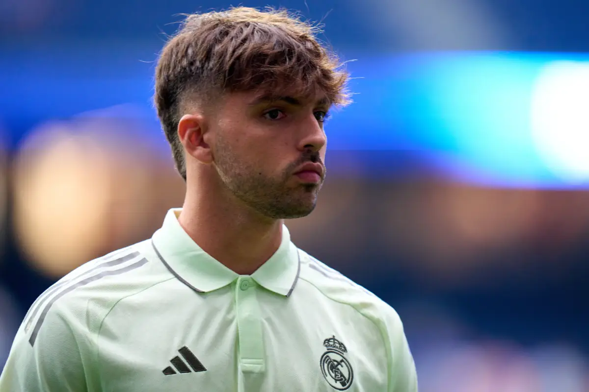 MADRID, SPAIN - AUGUST 19: Raul Asencio of Real Madrid inspects the pitch prior to the LaLiga EA Sports match between Real Madrid CF and CA Osasuna at Estadio Santiago Bernabeu on August 19, 2025 in Madrid, Spain. (Photo by Angel Martinez/Getty Images)