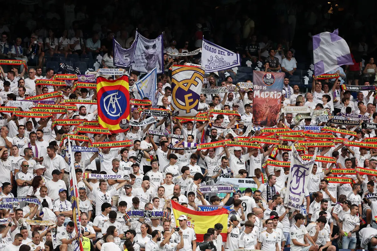 MADRID, SPAIN - SEPTEMBER 20: Fans of Real Madrid show their support during the LaLiga EA Sports match between Real Madrid CF and RCD Espanyol de Barcelona at Estadio Santiago Bernabeu on September 20, 2025 in Madrid, Spain. (Photo by Florencia Tan Jun/Getty Images)