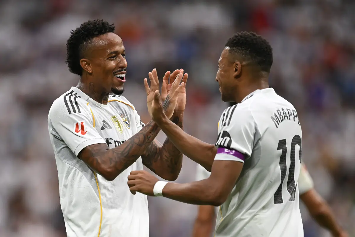 MADRID, SPAIN - SEPTEMBER 20: Eder Militao of Real Madrid celebrates scoring his team's first goal with teammate Kylian Mbappe during the LaLiga EA Sports match between Real Madrid CF and RCD Espanyol de Barcelona at Estadio Santiago Bernabeu on September 20, 2025 in Madrid, Spain. (Photo by Denis Doyle/Getty Images)