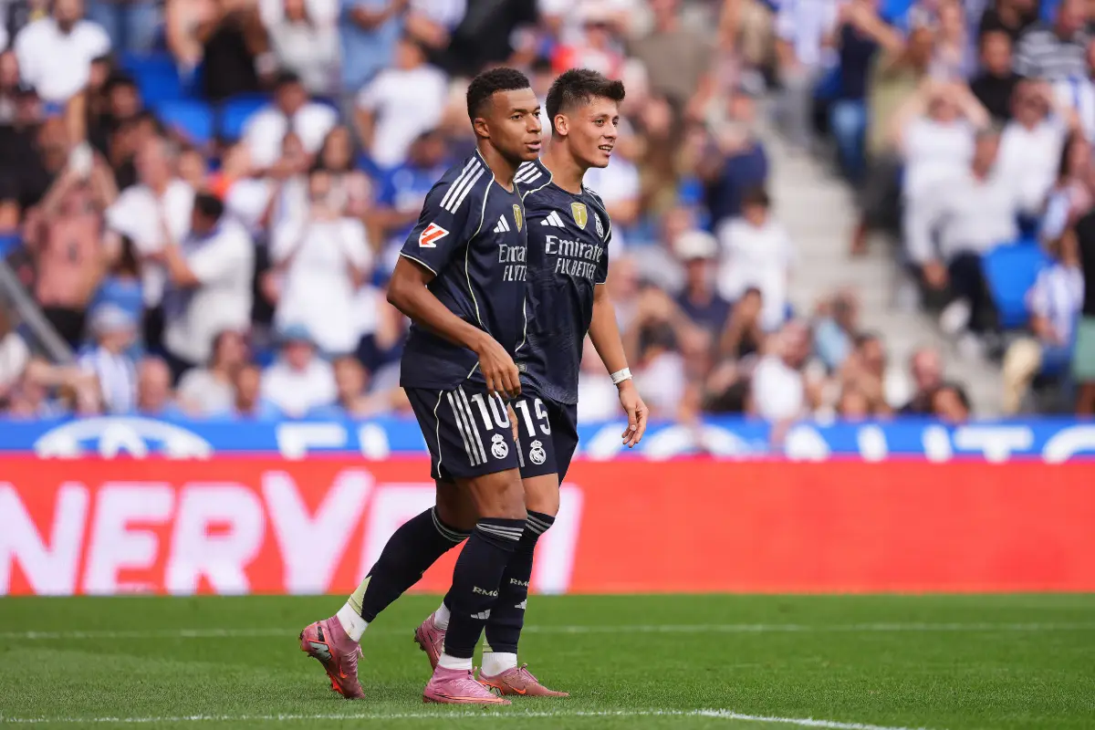SAN SEBASTIAN, SPAIN - SEPTEMBER 13: Arda Güler of Real Madrid celebrates scoring his team's second goal with teammate Kylian Mbappe during the LaLiga EA Sports match between Real Sociedad and Real Madrid CF at Reale Arena on September 13, 2025 in San Sebastian, Spain. (Photo by Juan Manuel Serrano Arce/Getty Images)