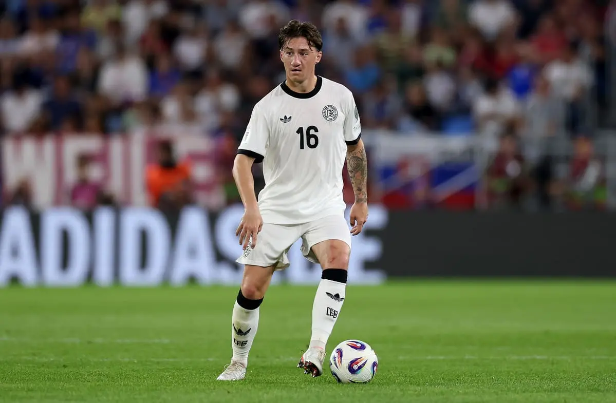 BRATISLAVA, SLOVAKIA - SEPTEMBER 04: Angelo Stiller of Germany runs with the ball during the FIFA World Cup 2026 qualifier match between Slovakia and Germany at on September 04, 2025 in Bratislava, Slovakia. (Photo by Lars Baron/Getty Images).