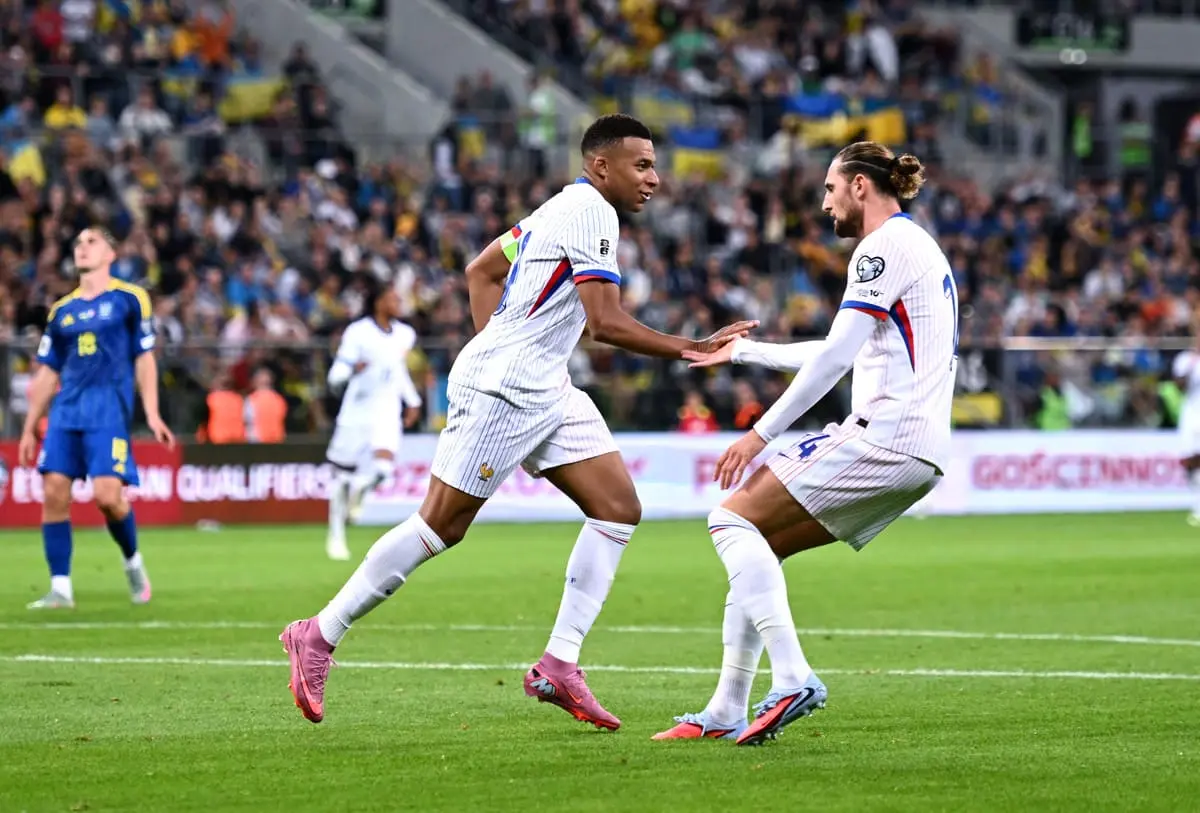 WROCLAW, POLAND - SEPTEMBER 05: Kylian Mbappe (Real Madrid) of France celebrates scoring his team's second goal with teammate Adrien Rabiot during the FIFA World Cup 2026 qualifier match between Ukraine and France at Tarczynski Arena on September 05, 2025 in Wroclaw, Poland. (Photo by Mateusz Slodkowski/Getty Images).