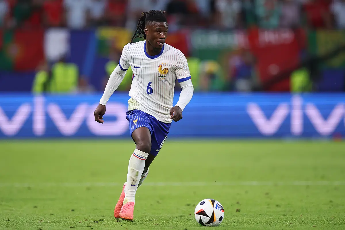 HAMBURG, GERMANY - JULY 05: Eduardo Camavinga of France controls the ball during the UEFA EURO 2024 quarter-final match between Portugal and France at Volksparkstadion on July 05, 2024 in Hamburg, Germany. (Photo by Alex Grimm/Getty Images)