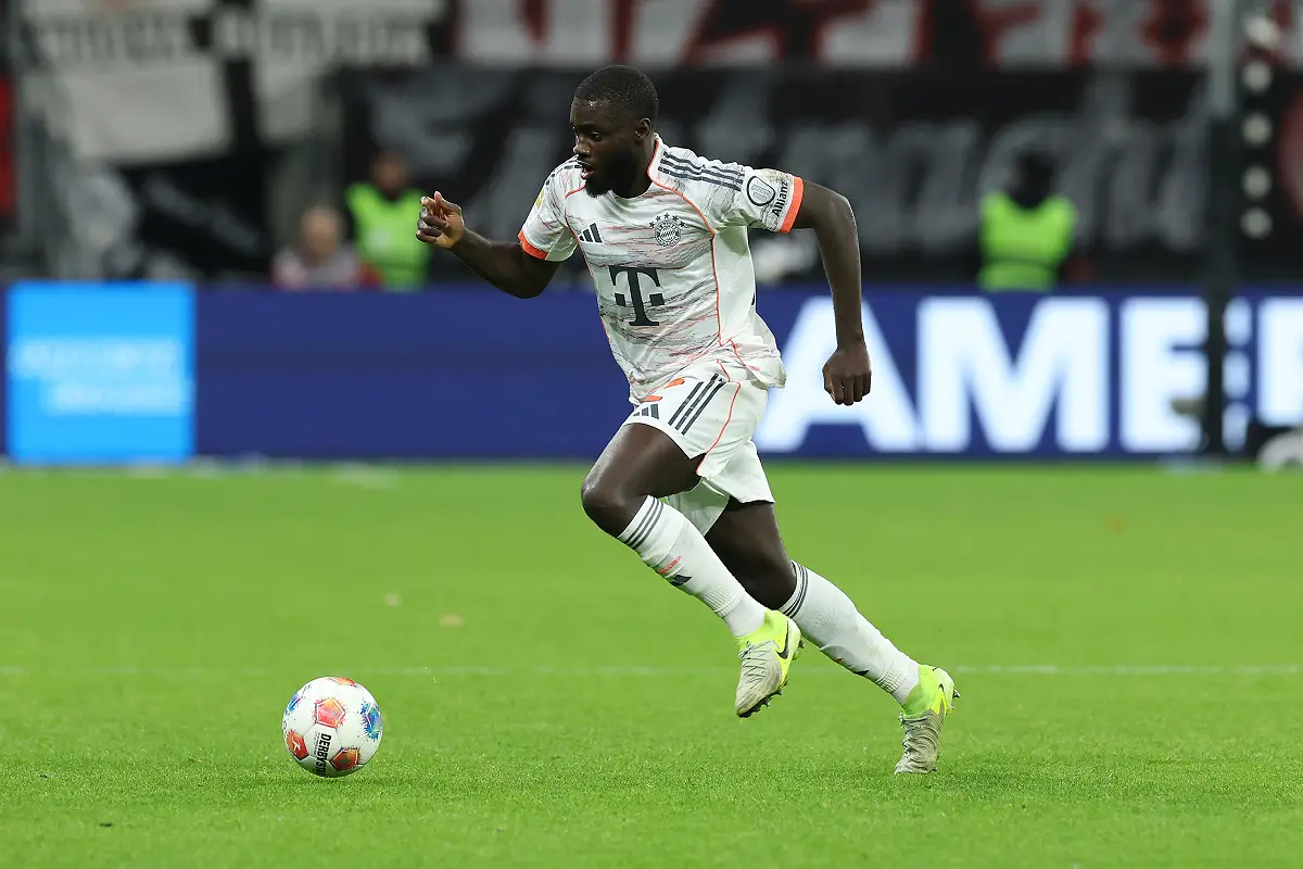 FRANKFURT AM MAIN, GERMANY - OCTOBER 04: Dayot Upamecano of FC Bayern München runs with the ball during the Bundesliga match between Eintracht Frankfurt and FC Bayern München at Deutsche Bank Park on October 04, 2025 in Frankfurt am Main, Germany. (Photo by Alexander Hassenstein/Getty Images)
