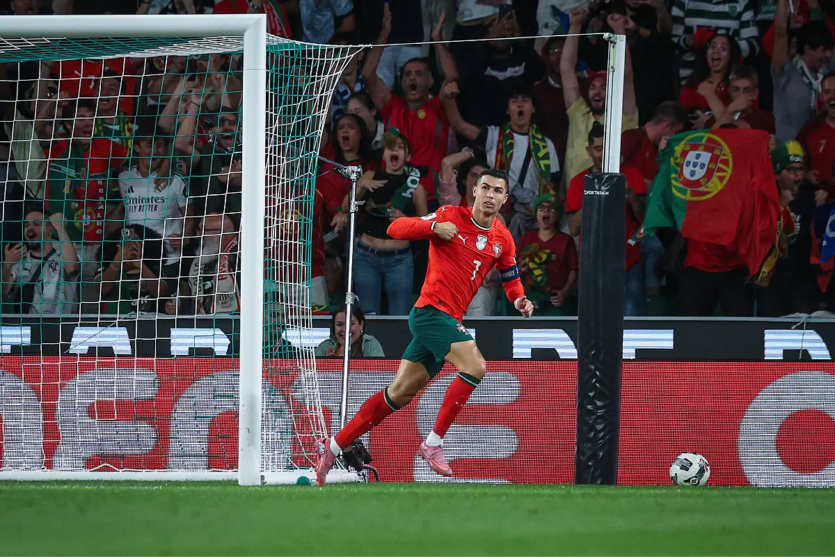 LISBON, PORTUGAL - OCTOBER 14: Cristiano Ronaldo of Portugal celebrates after scoring his team's first goal during the FIFA World Cup 2026 qualifier match between Portugal and Hungary at Estadio Jose Alvalade on October 14, 2025 in Lisbon, Portugal. (Photo by Carlos Rodrigues/Getty Images)