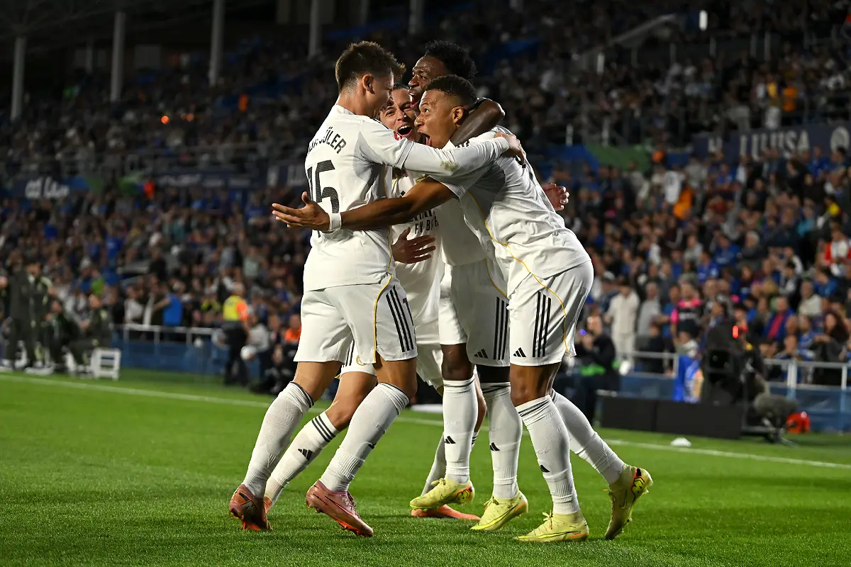 GETAFE, SPAIN - OCTOBER 19: Kylian Mbappe of Real Madrid celebrates scoring his team's first goal with teammates Arda Gueler, Alvaro Carreras and Vinicius Junior during the LaLiga EA Sports match between Getafe CF and Real Madrid CF at Coliseum Alfonso Perez on October 19, 2025 in Getafe, Spain. (Photo by Denis Doyle/Getty Images)