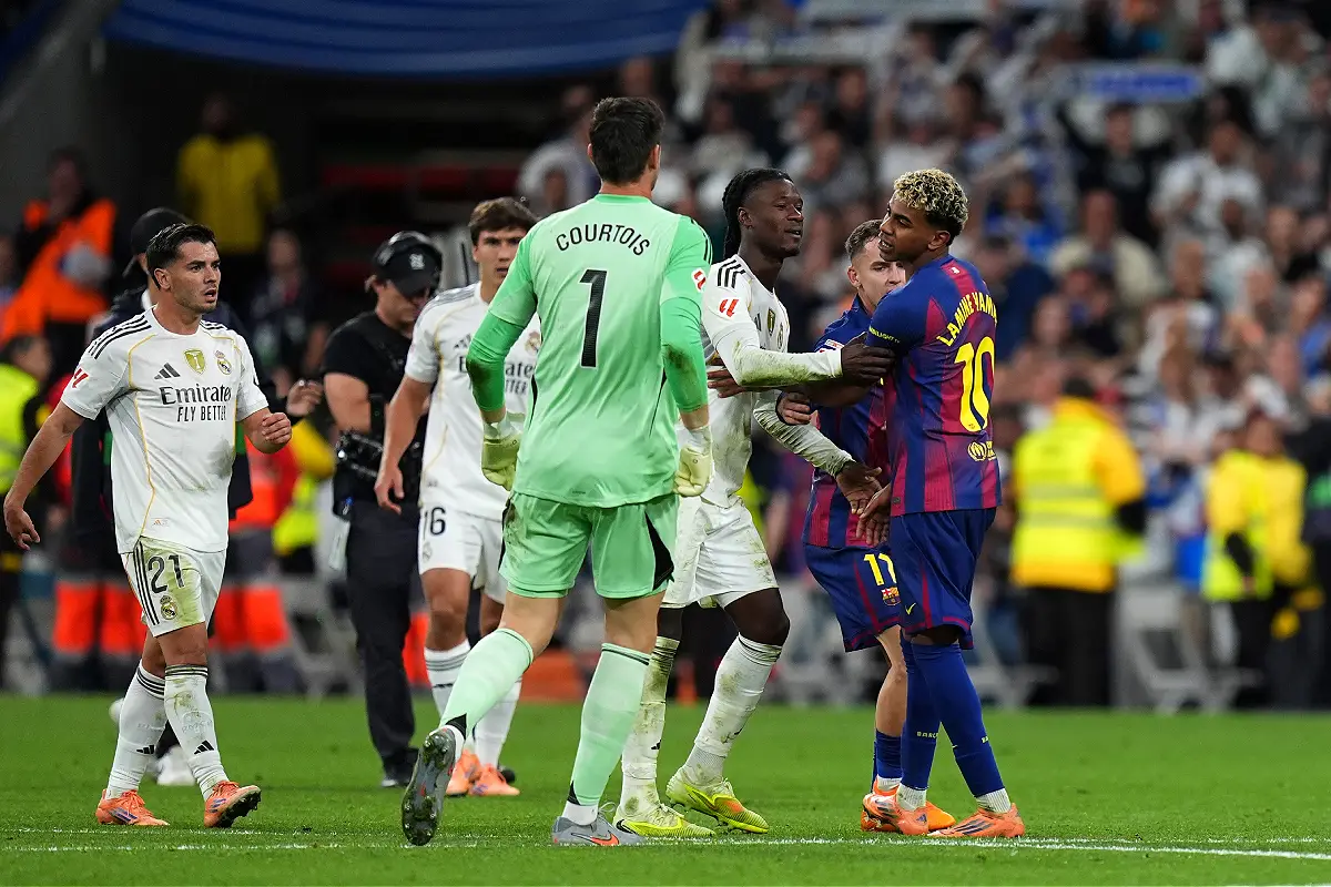 MADRID, SPAIN - OCTOBER 26: Lamine Yamal of FC Barcelona clashes with Eduardo Camavinga of Real Madrid after the LaLiga EA Sports match between Real Madrid CF and FC Barcelona at Estadio Santiago Bernabeu on October 26, 2025 in Madrid, Spain. (Photo by Angel Martinez/Getty Images)