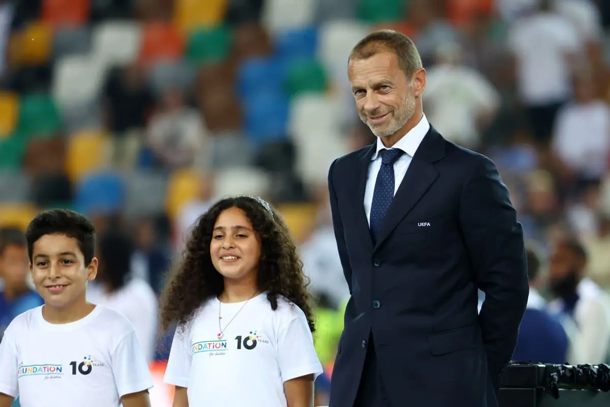 UDINE, ITALY - AUGUST 13: Aleksander Ceferin, President of UEFA, looks on, while waiting to present the UEFA Super Cup Trophy following the UEFA Super Cup 2025 match between Paris Saint-Germain and Tottenham Hotspur at Stadio Friuli on August 13, 2025 in Udine, Italy. (Photo by Francesco Scaccianoce/Getty Images).