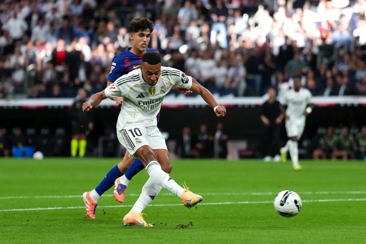 MADRID, SPAIN - OCTOBER 26: Kylian Mbappe of Real Madrid scores his team's first goal during the LaLiga EA Sports match between Real Madrid CF and FC Barcelona at Estadio Santiago Bernabeu on October 26, 2025 in Madrid, Spain. (Photo by Angel Martinez/Getty Images)