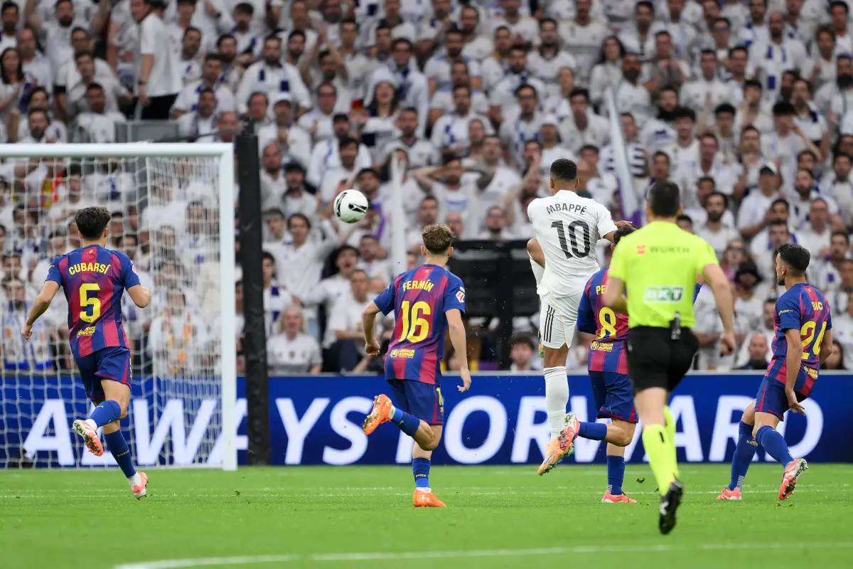 MADRID, SPAIN - OCTOBER 26: Kylian Mbappe of Real Madrid scores a goal with a volley from outside of the box, which is later disallowed following an offside decision via a VAR Review, during the LaLiga EA Sports match between Real Madrid CF and FC Barcelona at Estadio Santiago Bernabeu on October 26, 2025 in Madrid, Spain. (Photo by David Ramos/Getty Images)
