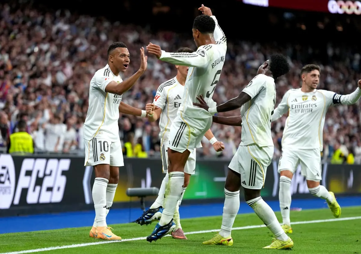 MADRID, SPAIN - OCTOBER 26: Kylian Mbappe of Real Madrid celebrates scoring his team's first goal with teammates Arda Gueler, Jude Bellingham and Vinicius Junior during the LaLiga EA Sports match between Real Madrid CF and FC Barcelona at Estadio Santiago Bernabeu on October 26, 2025 in Madrid, Spain. (Photo by Angel Martinez/Getty Images).