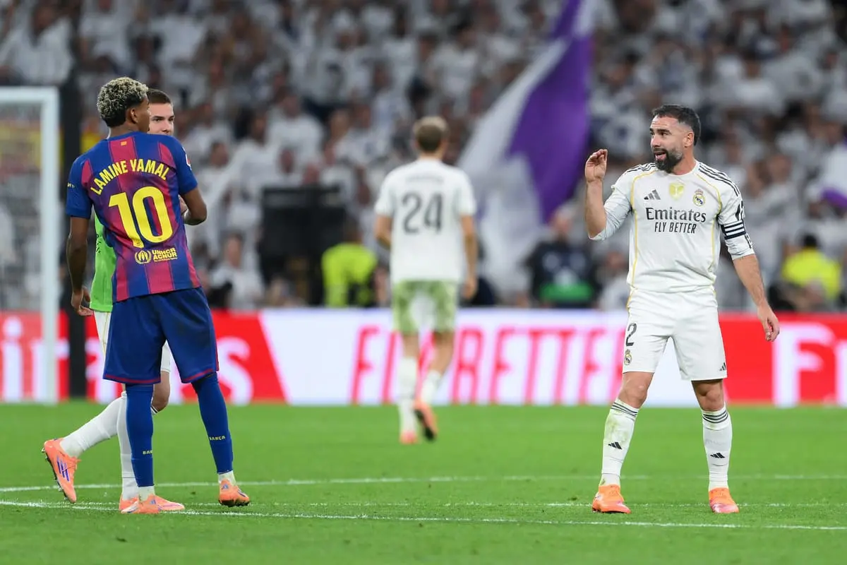MADRID, SPAIN - OCTOBER 26: Dani Carvajal of Real Madrid gestures towards Lamine Yamal of FC Barcelona after the LaLiga EA Sports match between Real Madrid CF and FC Barcelona at Estadio Santiago Bernabeu on October 26, 2025 in Madrid, Spain. (Photo by David Ramos/Getty Images).