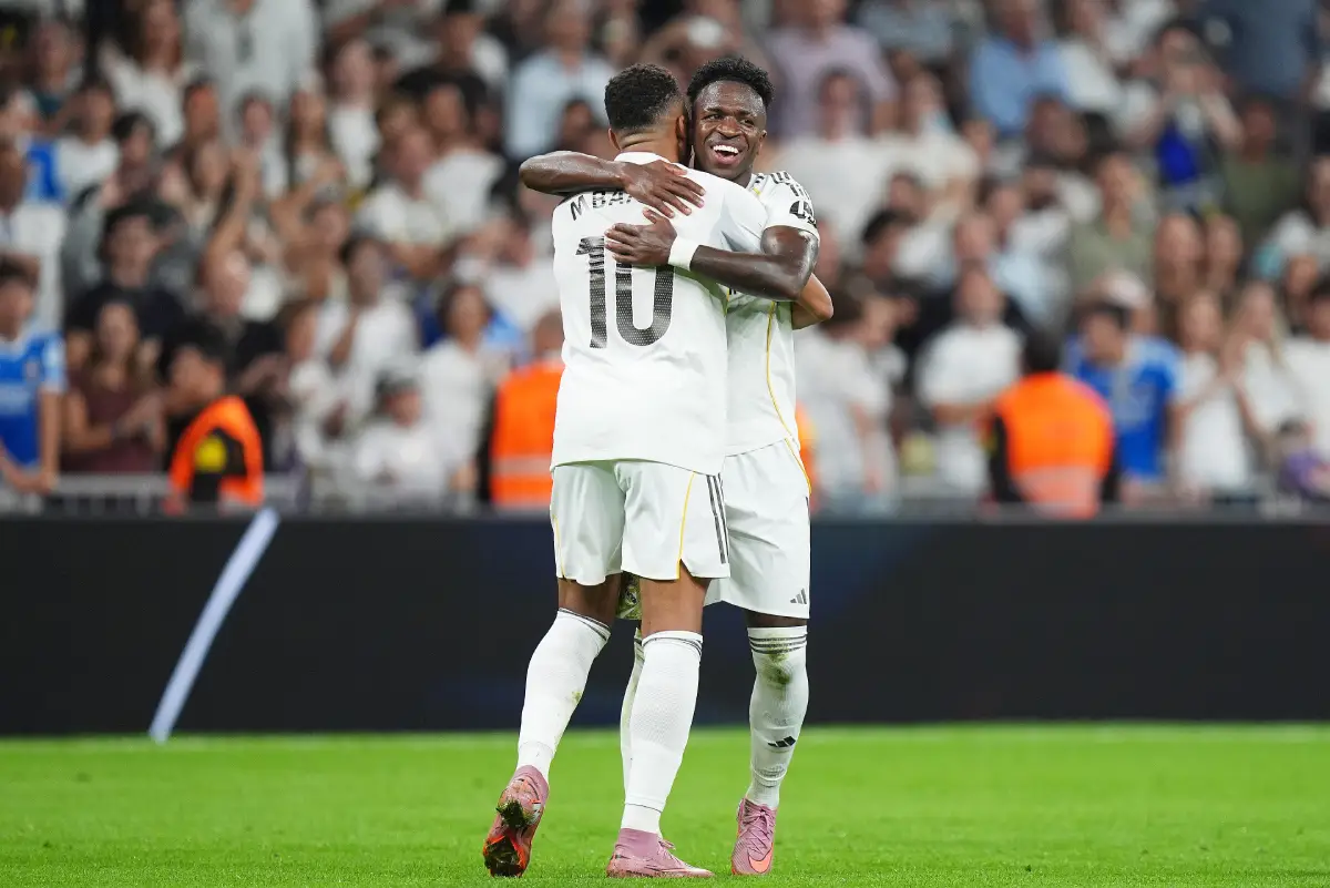 MADRID, SPAIN - OCTOBER 04: Vinicius Junior of Real Madrid celebrates with team mate Kylian Mbappe after scoring his team's second goal during the LaLiga EA Sports match between Real Madrid CF and Villarreal CF at Estadio Santiago Bernabeu on October 04, 2025 in Madrid, Spain. (Photo by Angel Martinez/Getty Images)