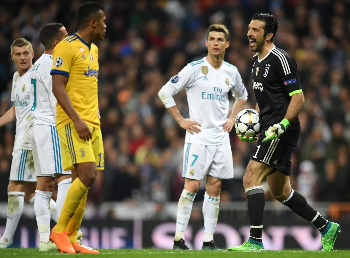 MADRID, SPAIN - APRIL 11: Gianluigi Buffon of Juventus reacts after Real Madrid are awarded a penalty during the UEFA Champions League Quarter Final Second Leg match between Real Madrid and Juventus at Estadio Santiago Bernabeu on April 11, 2018 in Madrid, Spain. (Photo by Matthias Hangst/Bongarts/Getty Images)