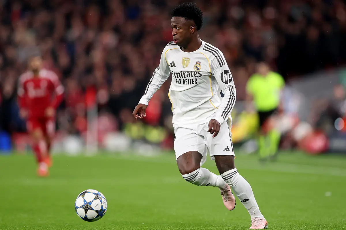 LIVERPOOL, ENGLAND - NOVEMBER 04: Vinicius Jr of Real Madrid runs with the ball during the UEFA Champions League 2025/26 League Phase MD4 match between Liverpool FC and Real Madrid C.F. at Anfield on November 04, 2025 in Liverpool, England. (Photo by Carl Recine/Getty Images)