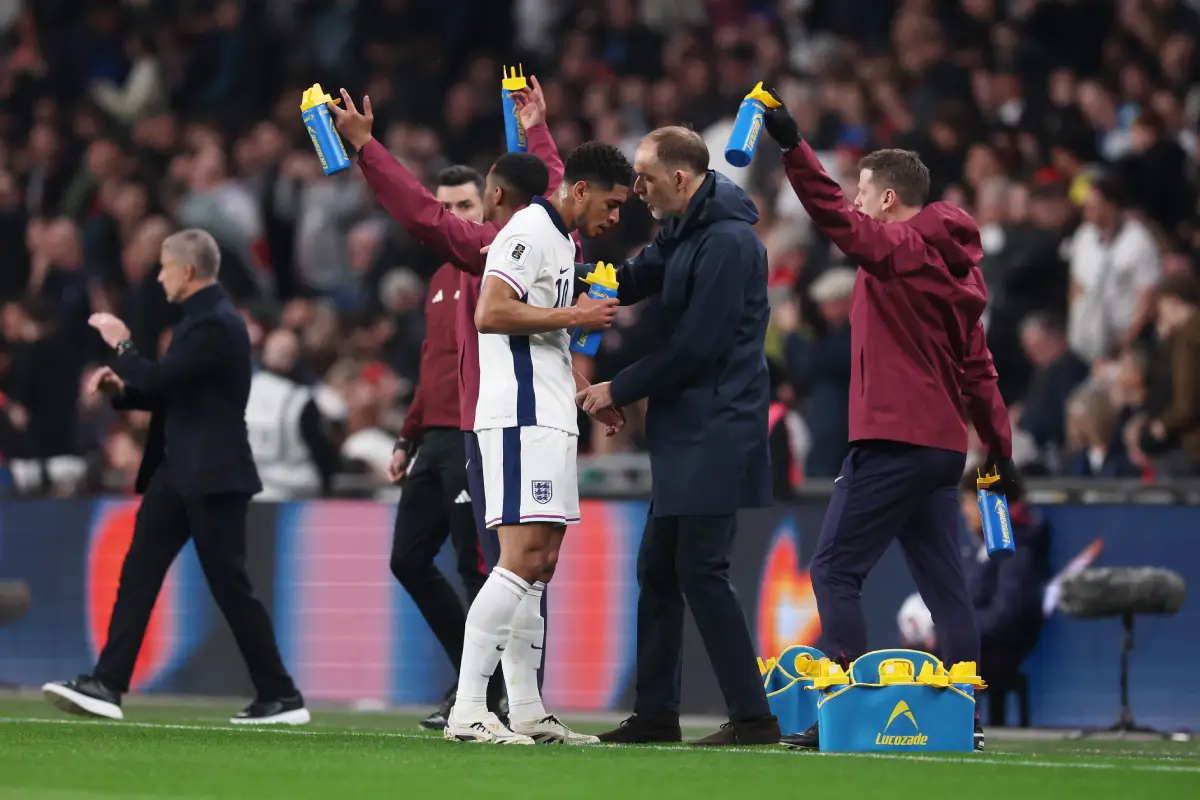 LONDON, ENGLAND - MARCH 21: Thomas Tuchel, Head Coach of England, speaks to Jude Bellingham of England during the FIFA World Cup 2026 European Qualifier between England and Albania at Wembley Stadium on March 21, 2025 in London, England. (Photo by Julian Finney/Getty Images)