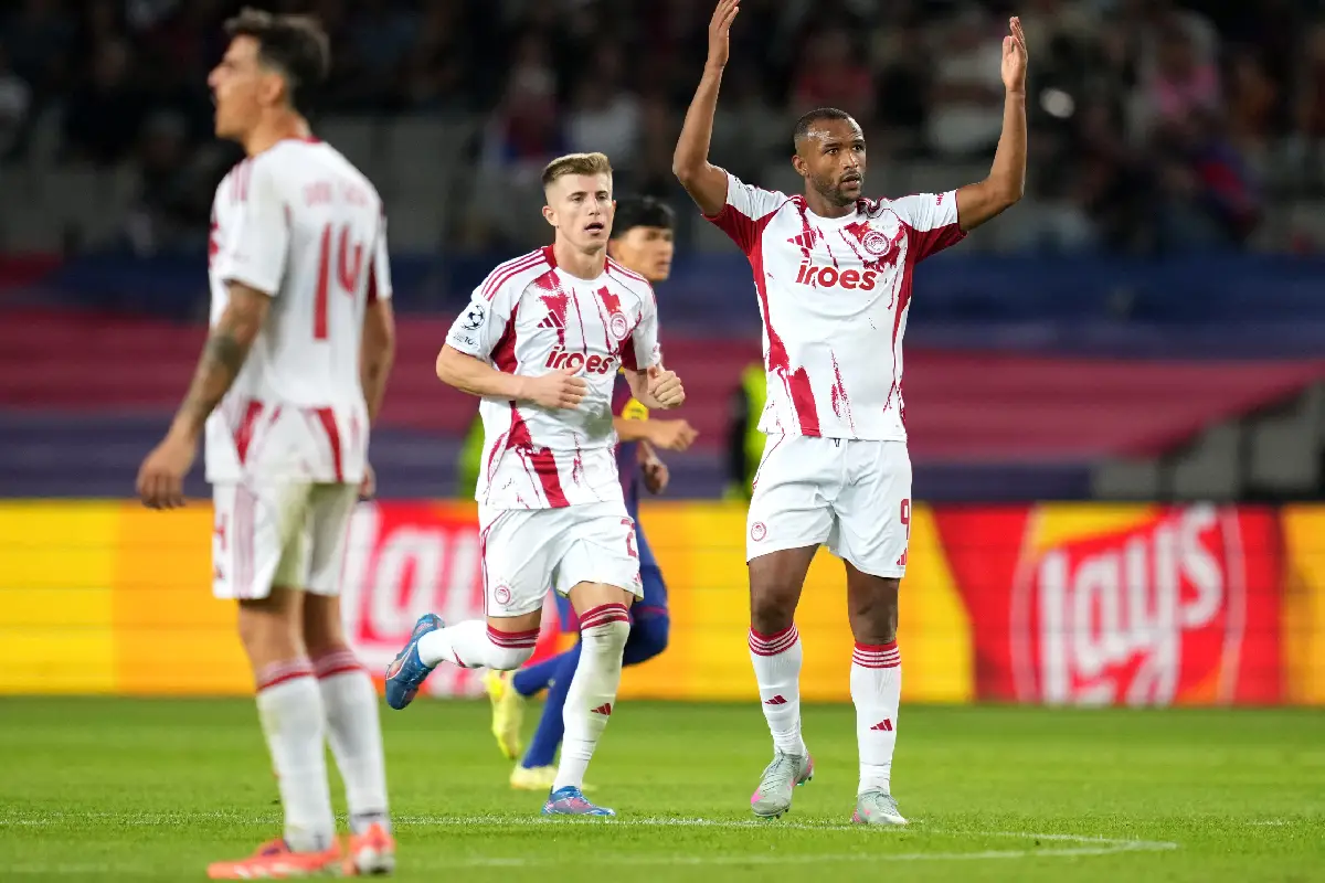 BARCELONA, SPAIN - OCTOBER 21: Ayoub El Kaabi of Olympiacos celebrates scoring his team's first goal from the penalty spot during the UEFA Champions League 2025/26 League Phase MD3 match between FC Barcelona and Olympiacos FC at Estadi Olimpic Lluis Companys on October 21, 2025 in Barcelona, Spain. (Photo by Alex Caparros/Getty Images)
