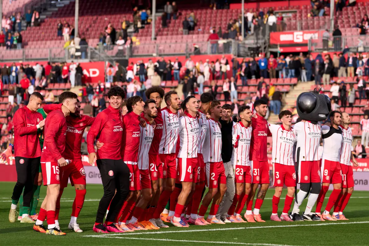 GIRONA, SPAIN - NOVEMBER 08: Girona FC players celebrate the victory in the LaLiga EA Sports match between Girona FC and Deportivo Alaves at Montilivi Stadium on November 08, 2025 in Girona, Spain. (Photo by Alex Caparros/Getty Images)