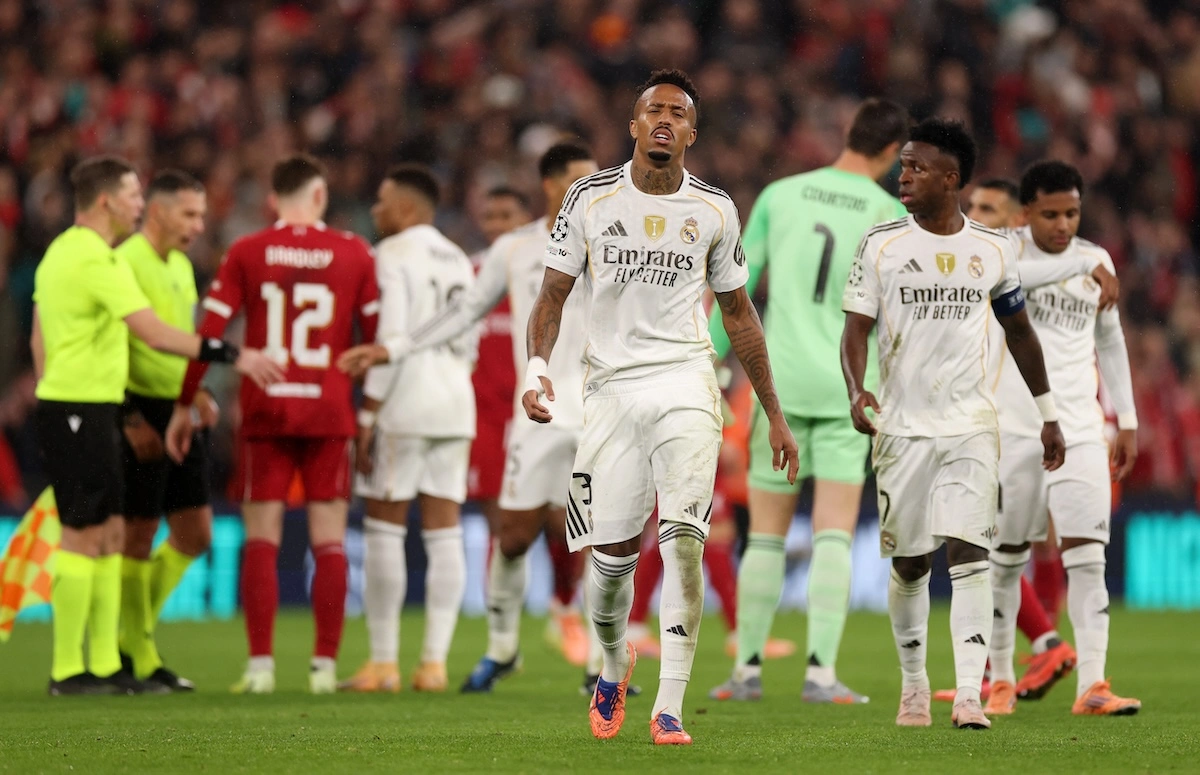 LIVERPOOL, ENGLAND - NOVEMBER 04: Eder Militao of Real Madrid looks dejected after the team's defeat in the UEFA Champions League 2025/26 League Phase MD4 match between Liverpool FC and Real Madrid C.F. at Anfield on November 04, 2025 in Liverpool, England. (Photo by Carl Recine/Getty Images)