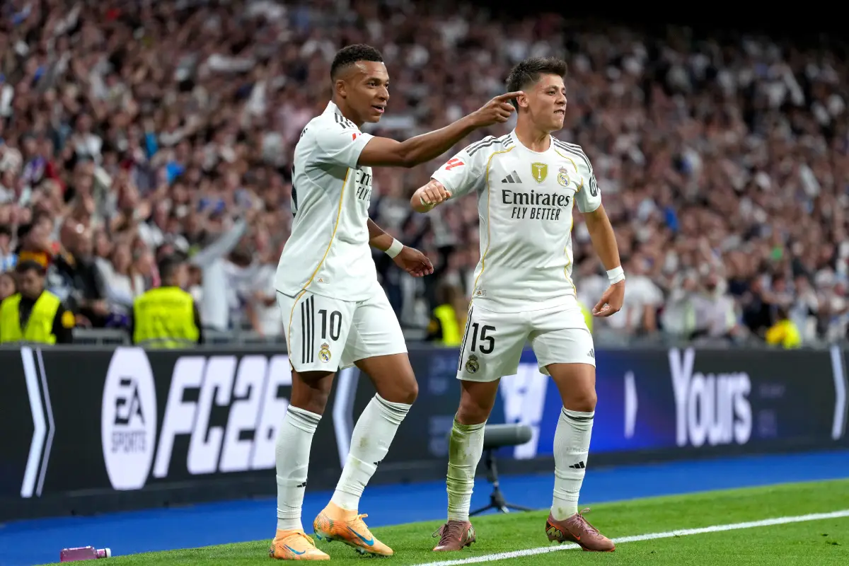 MADRID, SPAIN - OCTOBER 26: Kylian Mbappe of Real Madrid celebrates scoring his team's first goal with teammate Arda Gueler during the LaLiga EA Sports match between Real Madrid CF and FC Barcelona at Estadio Santiago Bernabeu on October 26, 2025 in Madrid, Spain. (Photo by Angel Martinez/Getty Images)