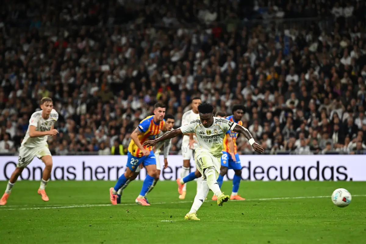MADRID, SPAIN - NOVEMBER 01: Vinicius Junior of Real Madrid has a penalty saved by Julen Agirrezabala of Valencia CF (not pictured) during the LaLiga EA Sports match between Real Madrid CF and Valencia CF at Estadio Santiago Bernabeu on November 01, 2025 in Madrid, Spain. (Photo by Denis Doyle/Getty Images)