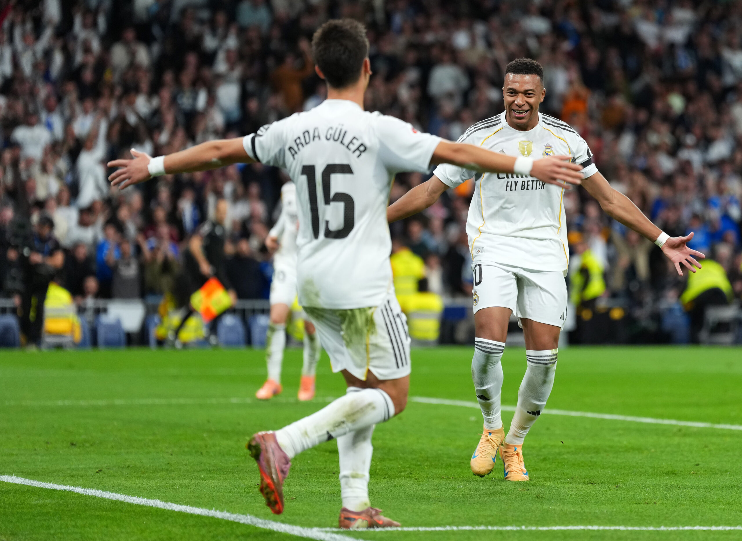 MADRID, SPAIN - NOVEMBER 01: Kylian Mbappe of Real Madrid celebrates scoring his team's second goal with teammate Arda Gueler during the LaLiga EA Sports match between Real Madrid CF and Valencia CF at Estadio Santiago Bernabeu on November 01, 2025 in Madrid, Spain. (Photo by Angel Martinez/Getty Images)